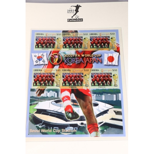 495 - Westminster Mint The 2002 World Cup Collection of stamps held across three albums with certificate o... 