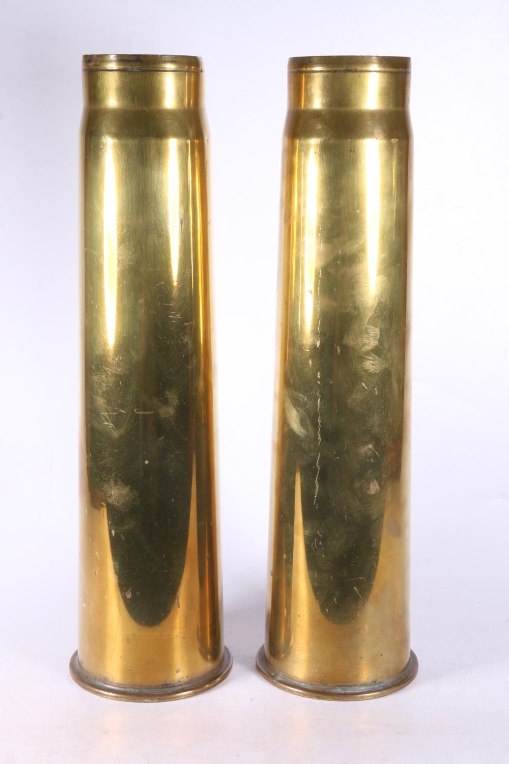 Pair of WWII brass artillery shell casings, 42cm tall.