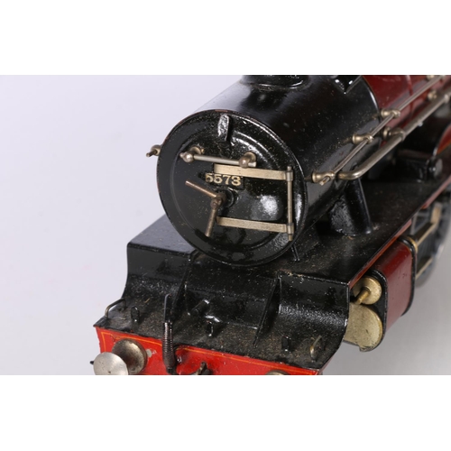 107 - O gauge model railways tender locomotive Class 5XP 5573 LMS maroon with Bassett Lowke 0-4-0 electric... 