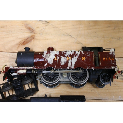 109 - O gauge model railways to include 4-6-2 tender locomotive 15360 LMS black, a 2-6-0 locomotive and a ... 