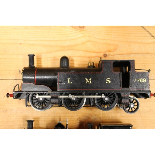 110 - O gauge model railways to include 0-6-2 locomotive 7789 LMS black and 0-4-0 clockwork locomotive 125... 