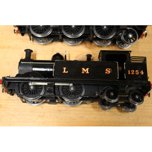 110 - O gauge model railways to include 0-6-2 locomotive 7789 LMS black and 0-4-0 clockwork locomotive 125... 