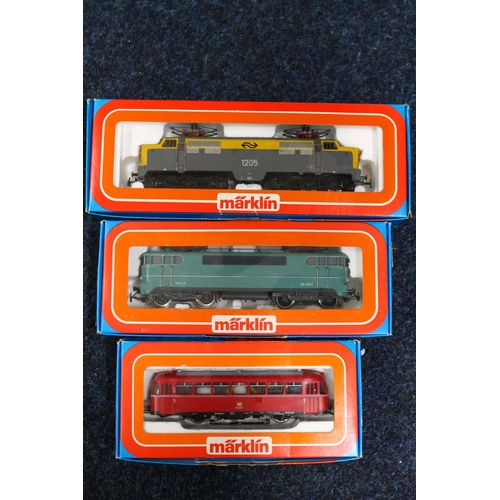 125 - Three Marklin of Germany OO gauge HO Scale model railway locomotives including 3055 electric locomot... 