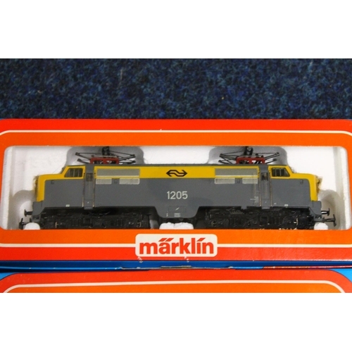 125 - Three Marklin of Germany OO gauge HO Scale model railway locomotives including 3055 electric locomot... 