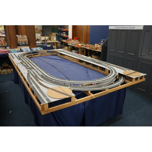 208 - Large two level model railway layout, made from four joining boards, also building, rail and other a... 