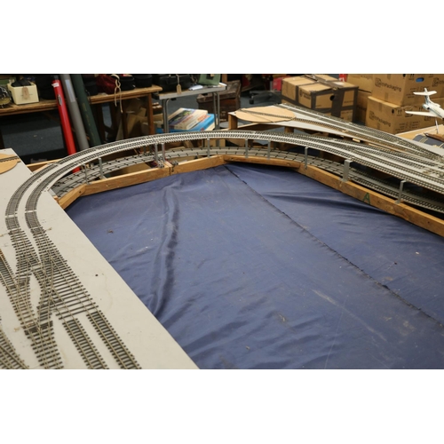 208 - Large two level model railway layout, made from four joining boards, also building, rail and other a... 