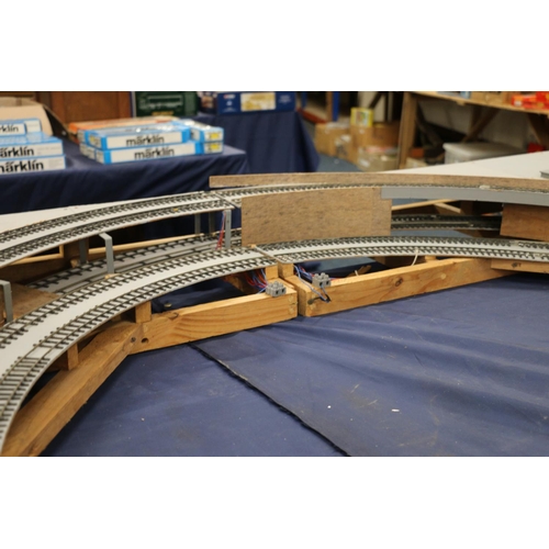 208 - Large two level model railway layout, made from four joining boards, also building, rail and other a... 