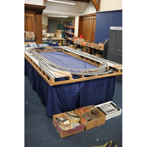 208 - Large two level model railway layout, made from four joining boards, also building, rail and other a... 