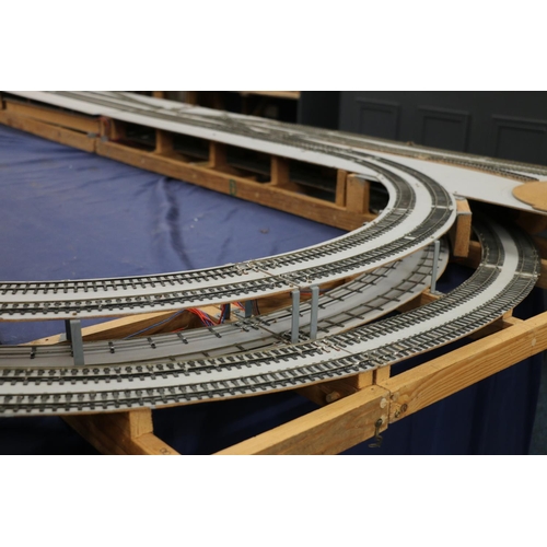 208 - Large two level model railway layout, made from four joining boards, also building, rail and other a... 