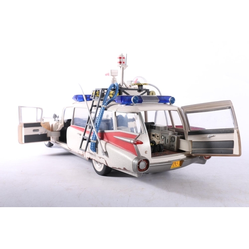 220 - Hasbro 8F0F2 Ghostbusters ECTO-1 Cadillac, Plasma Series, boxed.