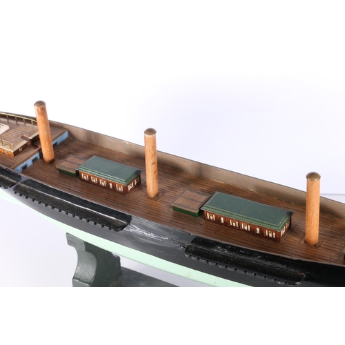 223 - Model ship hull 'Ariel' raided on wooden plinth, 58cm long.