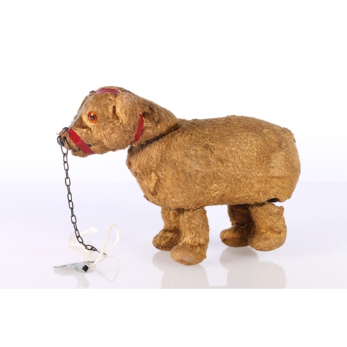 263 - Early 20th century German clockwork model of a walking bear, 15cm long.