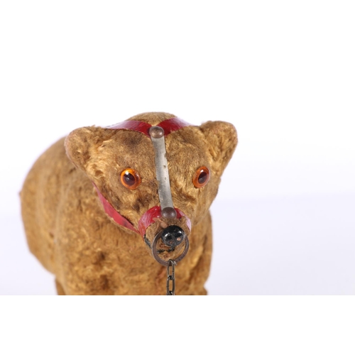 263 - Early 20th century German clockwork model of a walking bear, 15cm long.