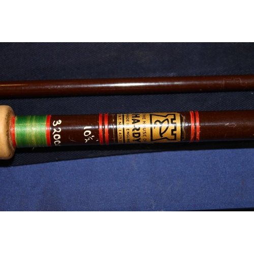 410 - House of Hardy two piece Invincible fishing rod #7 10 1/2 320cm in blue cloth bag, and a Scott MacKe... 