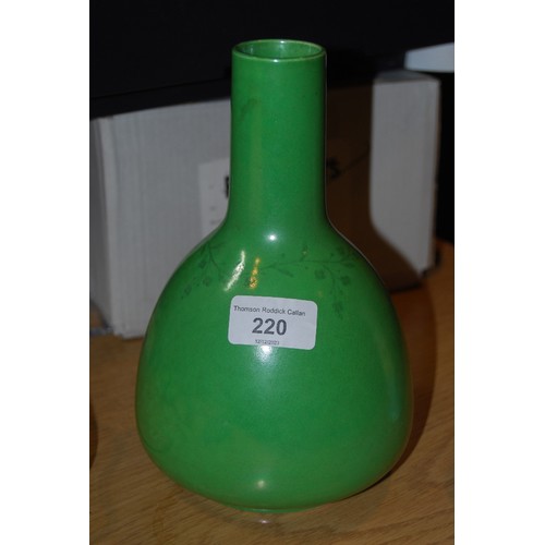 220 - Two Ruskin Pottery vases, one with colourful drip decoration, 15cm high, the other of bottle shape o... 