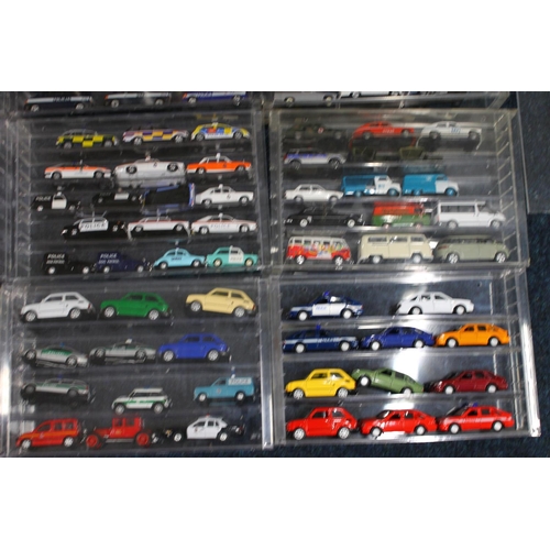 195 - Large collection of diecast emergency and other vehicles held in perspex cases, makers including Lle... 