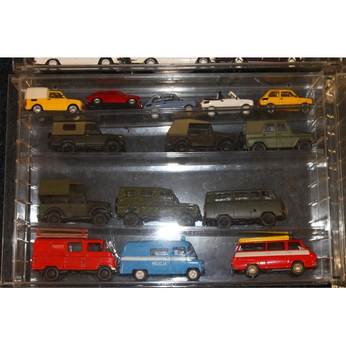 197 - Large collection of model vehicles held in perspex cases, makers including Welly, Amercom, Oxford, V... 