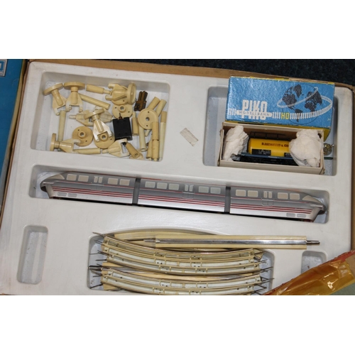 203 - Piko Modellbahn OO gauge electric train set with 0-4-0 locomotive etc. boxed, a 6002 diesel locomoti... 