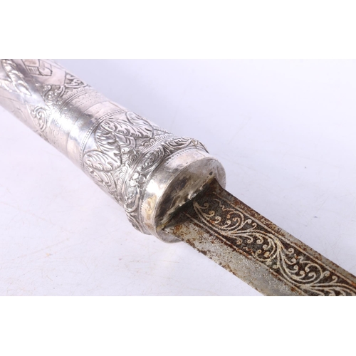 787 - Burmese dha / Thai daab type sword, the 59cm long blade with engraved scroll band, the handle with r... 