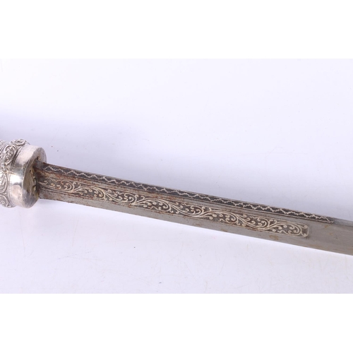 787 - Burmese dha / Thai daab type sword, the 59cm long blade with engraved scroll band, the handle with r... 