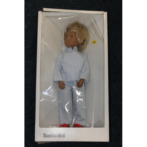 269 - Sasha doll 5103 Gregor wearing light blue pyjamas, boxed.