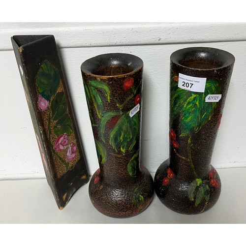 207 - Three carved wooden vases, hand painted with floral decoration.