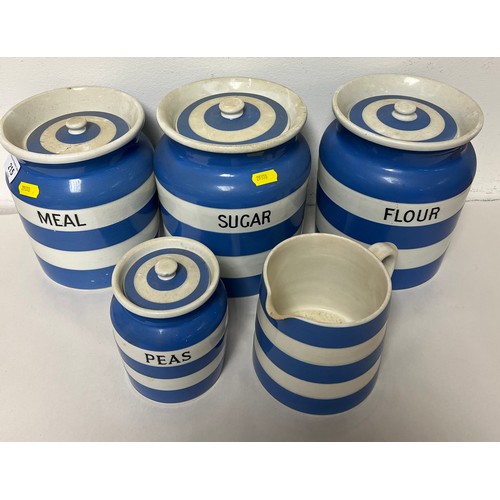 215 - Four Cornish Ware kitchen storage jars and a jug (5).