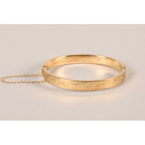 65 - 9ct gold stiff bangle.weight 13 grams