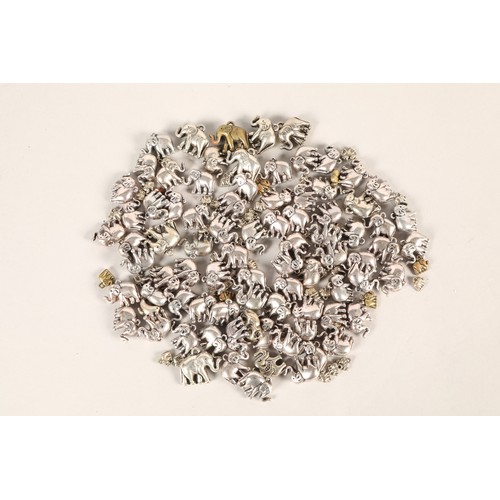 96 - Quantity of white metal elephant pendants.