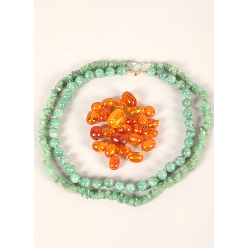 101 - Two Jadeite necklaces & amber beads.