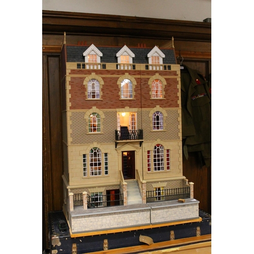 274 - Large dolls house modelled on a four story town house with basement level, a fine example with high ... 