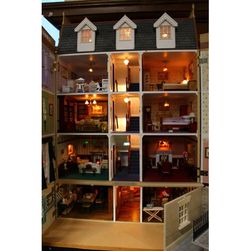 274 - Large dolls house modelled on a four story town house with basement level, a fine example with high ... 