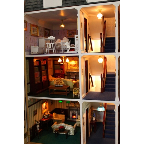 274 - Large dolls house modelled on a four story town house with basement level, a fine example with high ... 