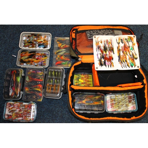 413 - Greys Platinum tackle bag and a large quantity of salmon and other fishing flies.