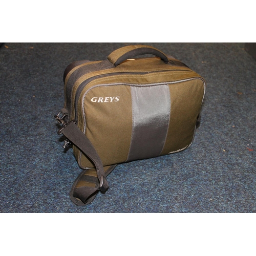 413 - Greys Platinum tackle bag and a large quantity of salmon and other fishing flies.