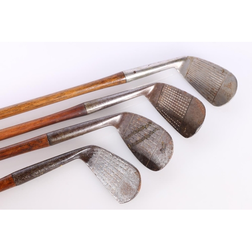 394 - Four hickory shafted golf clubs including James Murry of Carnoustie special mashie, Alex Aitken of G... 