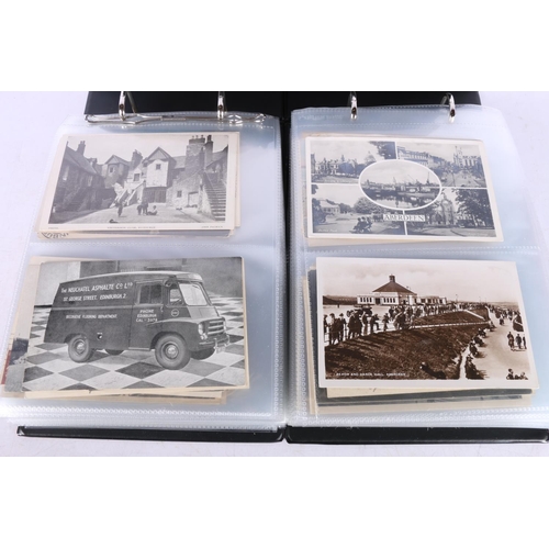 440 - Two leatherette slip case binder albums containing around 400 postcards of Scottish topographical in... 