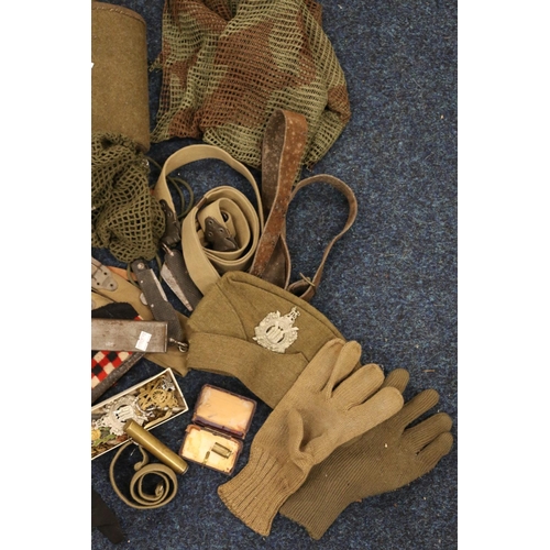 856 - Khaki beret with Kings Own Scottish Borderers cap badge, a Glengarry with KOSB cap badge, a green kh... 