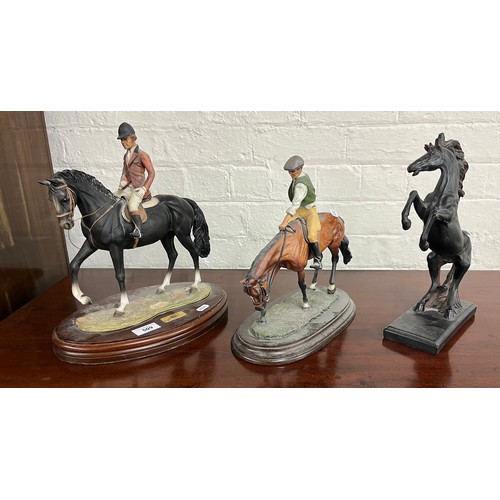 509 - Three assorted horse ornaments