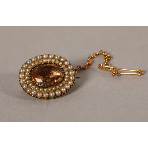 48 - Citrine and seed pearl yellow metal brooch