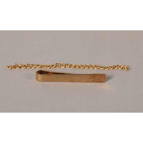 49 - 9 ct yellow gold tie clip& yellow metal part chain.tie clip weight 4.4 grams