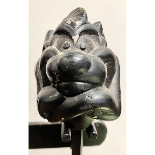 454 - Wrought iron companion stand with tasmanian devil finials