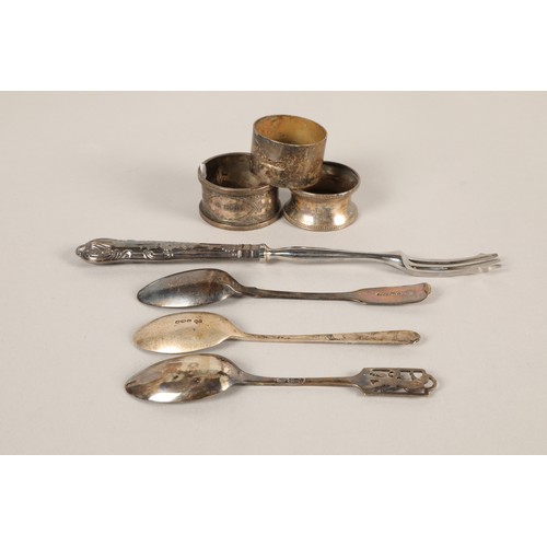 129 - Silver spoons, napkin rings & pickle forks.total weight 146 grams(excluding fork)