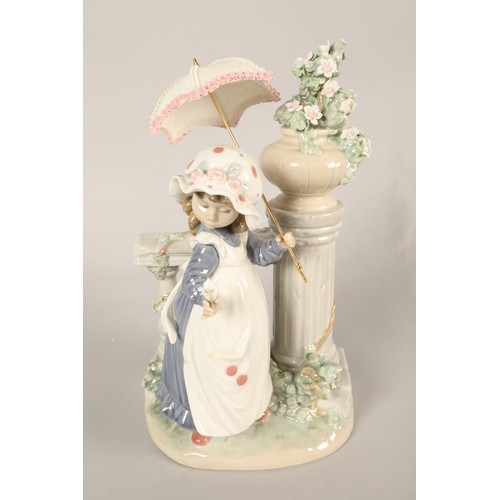 169 - Lladro figure, girl with an umbrella.