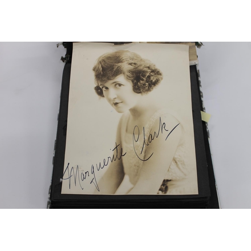 460 - Album of large photographs of celebrities and notaries including Queen Elizabeth II, Princess Margar... 