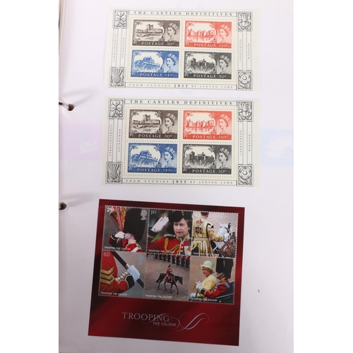 543 - Stamp collection held across multiple albums to include an alum of ISLE OF MAN mint commemorative st... 