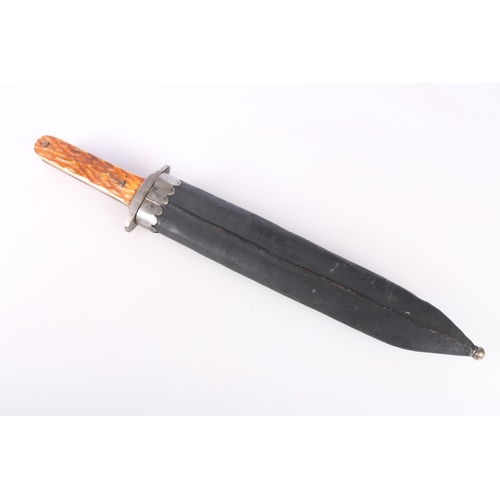 865 - Bowie hunting knife with carved bone or horn hilt, the blade with scalloped spine, blade length 25cm... 