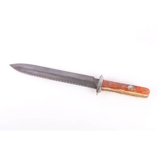 865 - Bowie hunting knife with carved bone or horn hilt, the blade with scalloped spine, blade length 25cm... 