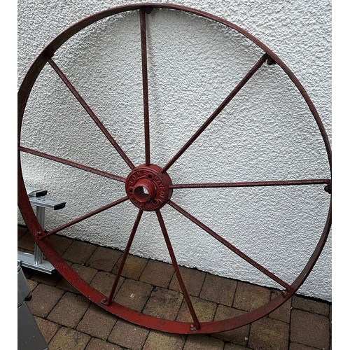 434 - Wrought iron cart wheel