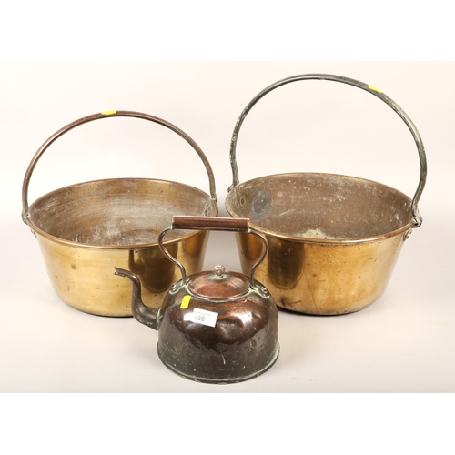 486 - Two brass jelly pans & copper kettle